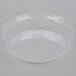 A clear plastic container lid on a white background.