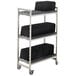 A metal Camshelving drying rack cart with black plastic trays on it.