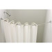 A white shower curtain on a Crescent Suite curved metal rod.