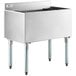 A Regency stainless steel underbar ice bin with two compartments on a counter.