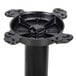 A black metal Lancaster Table & Seating end column table base with a square object.