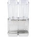 A Crathco refrigerated beverage dispenser with two clear containers on top.