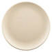 A white Elite Global Solutions round melamine plate with a small rim.