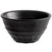 A black melamine bowl with a round shape.