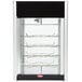 A Hatco Flav-R-Fresh humidified glass cabinet with a glass door and four tier circle rack.