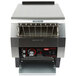 A Hatco Toast Qwik conveyor toaster machine on a counter with black and red control knobs.