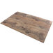 An Elite Global Solutions rectangular melamine serving board with a faux driftwood surface and knots.