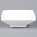 A CAC bright white square porcelain bowl with a small square base.