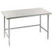 An Advance Tabco stainless steel work table with galvanized steel legs.