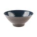 A close-up of an Elite Global Solutions bowl with a blue rim and a blue and white pebble design.
