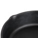 A close-up of a black Elite Global Solutions faux cast iron fry pan.