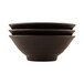 Three Elite Global Solutions Pebble Creek aubergine melamine bowls stacked on top of each other.