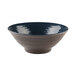A white melamine bowl with a textured surface and a dark blue rim.