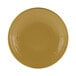 A close up of an olive oil-colored Elite Global Solutions pebble textured round plate.