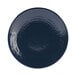 A close-up of an Elite Global Solutions Pebble Creek Lapis-colored round plate with a black rim.