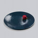 An Elite Global Solutions lapis-colored melamine plate with a red rose on it.