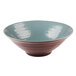 An Elite Global Solutions melamine bowl with a light blue and brown pebble design.