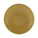 A yellow round melamine plate with a pebble texture.
