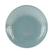An abyss-blue Elite Global Solutions round plate with a white rim.