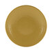A yellow plate with a textured surface.