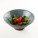 An Elite Global Solutions Pebble Creek Abyss-colored melamine bowl filled with tomatoes and spinach.