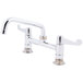 A chrome Equip by T&S deck-mounted faucet with wrist handles and an 8" swing spout.