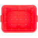 A red plastic container with holes.