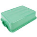 A green plastic Vollrath Traex drain box with a lid.