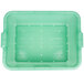 A green plastic Vollrath Color-Mate drain box with holes.