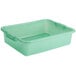 A Vollrath Traex green plastic rectangular food storage container with handles.