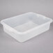 A Vollrath Traex Color-Mate clear plastic drain box with a handle on a white background.