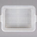 A Vollrath Traex clear plastic drain box with holes in it.