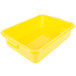 A yellow plastic Vollrath Traex drain box.