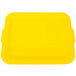 A yellow plastic Vollrath Color-Mate food storage box lid.