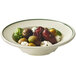 A white GET Kingston melamine bowl filled with green and red olives and cheese.