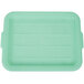 A green Vollrath Traex Color-Mate food storage box lid with a handle and lines.