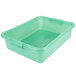 A green Vollrath Traex food storage container with a lid and handles.
