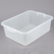 A white plastic Vollrath Color-Mate perforated drain box with lid.