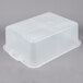 A white plastic Vollrath Traex Color-Mate perforated drain box.