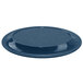 A blue oval melamine platter with a black border on a table.
