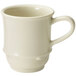 A white plastic mug with a handle.