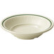 A white bowl with green trim.