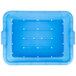 A blue plastic Vollrath Color-Mate drain box with holes in it.