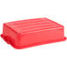 A Vollrath red plastic container with a lid.