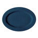 A blue oval platter with a speckled surface.