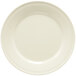 A white plate with a ribbed edge.