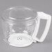 A Proctor Silex glass carafe with a white handle.
