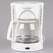 A white coffee maker with a Proctor Silex glass carafe.