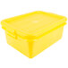 A Vollrath yellow plastic food storage box with recessed lid.