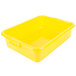 A yellow plastic Vollrath food storage container with a lid.
